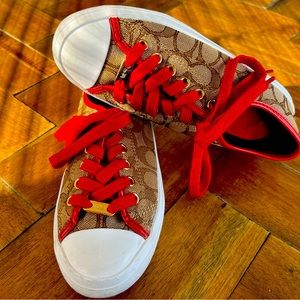 Coach Signature Jacquard Lace Up Closure Women Sneakers. Rubber outsole.